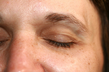 Wrinkles around the eye. Wrinkles on woman face skin.
