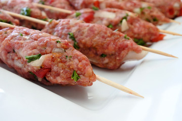 Uncooked Kebab sticks ready to be grilled on BBQ