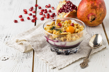Fruit layered dessert with fresh strawberry, zephyr( marshmallow), sour cream and mint