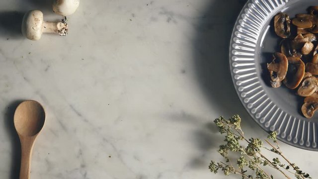 Healthy eating, serving mushroom soup in a bowl. take off the table a bowl of creamy and rustic white soup with mushroom. Eating healthy vegetarian dinner. Cozy and warm food. Autumn warm puree.