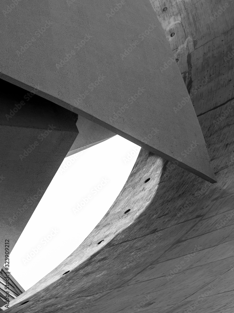 Poster black and whtie abstract image of sharp and curved lines at modern architecture building made of met