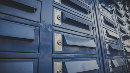 blue Multiple mailboxes close up