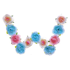 Letter W, made of flowers. English alphabet. Spring, nature