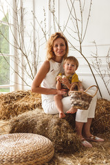 Children at Easter with rabbits and ducks