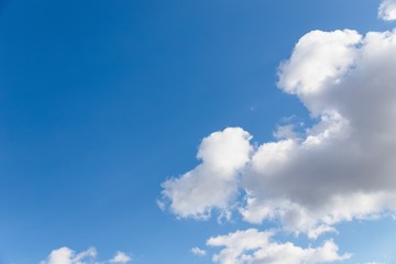 Obraz na płótnie Canvas Scenic sky. Beautiful white soft fluffy clouds on a blue sky background