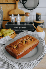 Cooking pear cake for Easter. Ingredients for making dough. Chocolate cake with pears in rustic style closeup.