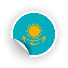 Sticker of Kazakhstan flag with peel off corner isolated on white background. Paper banner or circle curl label sticker with flip edge. Vector color post note for advertising design
