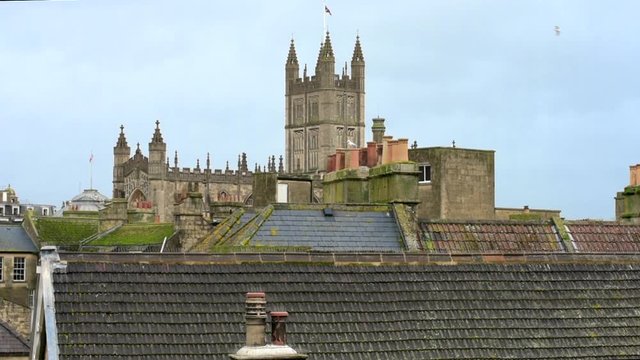 A virbrant view across the rooftops, towards the Abbey, in the Roman ancient city of Bath in the West Country of England