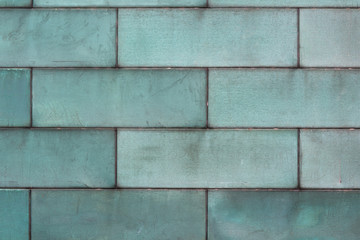 green tarnished copper background metal texture with copy space