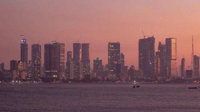 Timelapse of dusk falling over Mumbai skyscrapers