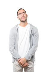 Fototapeta premium Serious young man looking against background