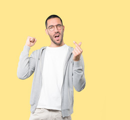 Young man making a gesture of worried about his economy