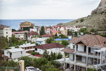 Walls and towers of ancient Genoese fortress in the city of Sudak, Crimea, Russia