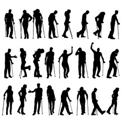 Fototapeta premium Vector silhouette of collection of disabled people. Symbol of man and woman with crutches.