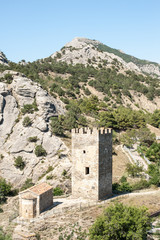 Fototapeta na wymiar Walls and towers of ancient Genoese fortress in the city of Sudak, Crimea, Russia