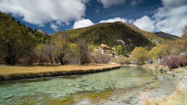 Time lapse of tourist travels Chonggu Temple in Daocheng Yading national reserve - Sichuan - China