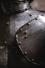 Close up detail Background with armour of the medieval knight. Metal protection of the soldier....