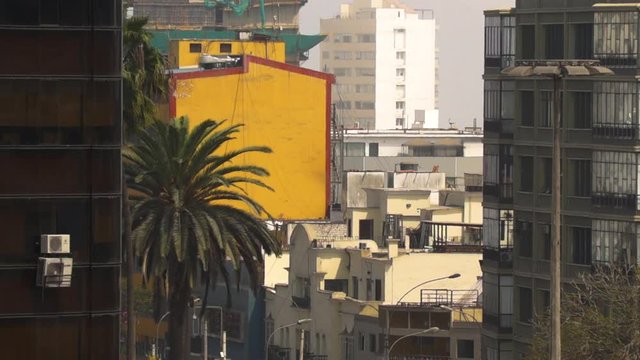 In between buildings in Lima, Peru on a warm summer day.