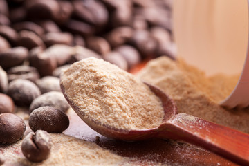 coffee beans with powder spoon