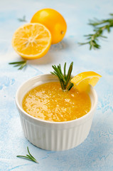 Homemade lemon jam with fresh lemons and sugar.