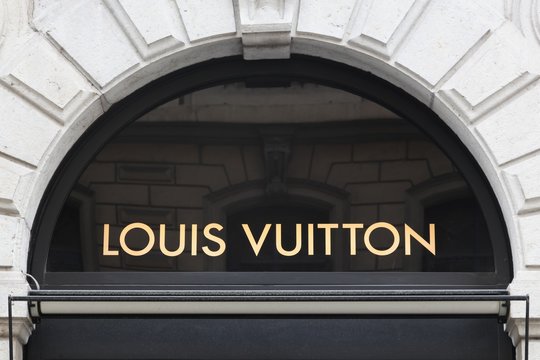 Lyon, France - February 26, 2017: Louis Vuitton sign on a wall. Louis Vuitton is a French company specialized in fashion accessories