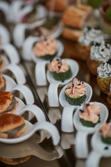 various delicious snacks on a wedding table in a restaurant