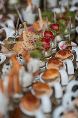 Fototapeta na wymiar various delicious snacks on a wedding table in a restaurant