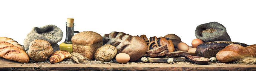 Banner with different types of bread and rolls, eggs, wheat, rye, sunflower oil and ears. Isolated on a white background. Toned. Panorama of five photos.