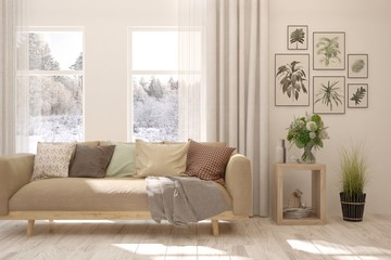 Stylish room in white color with sofa and winter landscape in window. Scandinavian interior design. 3D illustration