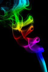 Obraz premium Colored smoke on black background
