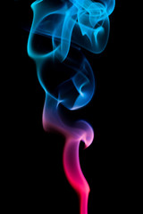 Colored smoke on black  background