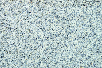 Light gray polished granite texture. Stone background