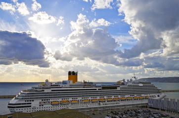 Italian Costa Cruises cruiseship or cruise ship liner with beautiful sunset or twilight in the...
