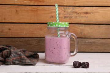 blackberry smoothie in color background