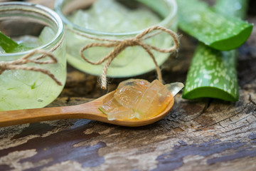 Close-Up Of aloe vera on wooden table.