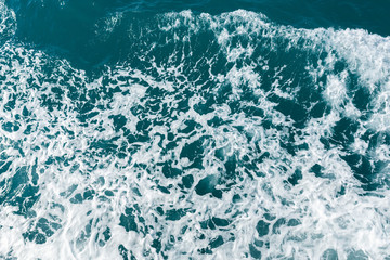Blue water in the ocean or in the sea. Turquoise waves and Aqua Mente and Phantom Blue. Photos for wallpaper or for background. Abstraction of the waves. Thailand