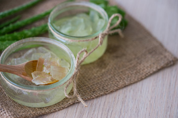 Close-Up Of aloe vera on wooden table.