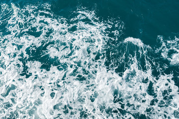 Blue water in the ocean or in the sea. Turquoise waves and Aqua Mente and Phantom Blue. Photos for wallpaper or for background. Abstraction of the waves. Thailand