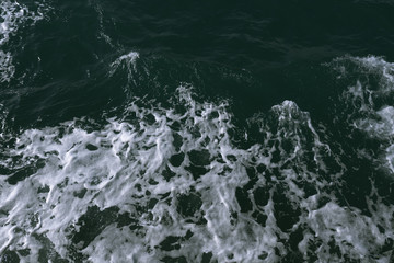 Blue water in the ocean or in the sea. Turquoise waves and Aqua Mente and Phantom Blue. Photos for wallpaper or for background. Abstraction of the waves. Thailand