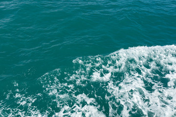 Blue water in the ocean or in the sea. Turquoise waves and Aqua Mente and Phantom Blue. Photos for wallpaper or for background. Abstraction of the waves. Thailand