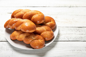 Delicious pastries.Tasty buns.Delicious Pigtail Buns