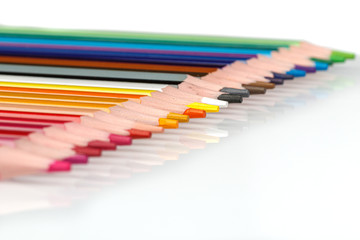 Multi-colored pencils in a row