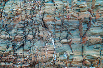 Color rock close up. Natural forms in stone structure. Background, texture. - 323946898