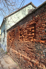 Brick wall of an old building in the city