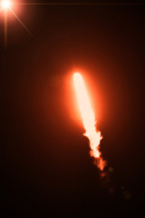 Rocket. Rocket tail. Rocket light. The elements of this image furnished by NASA.