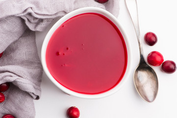 Bowl of Jelly with Cranberry on a white background