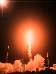 Rocket launch into dramatic sky. The elements of this image furnished by NASA.