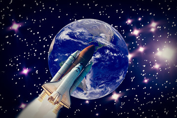 Rocket flies from the earth. The elements of this image furnished by NASA.