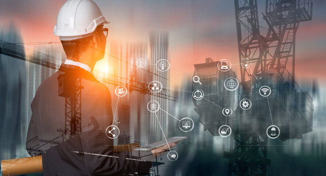 Double exposure engineering using digital technology interfaces icon with construction cranes no city background.	