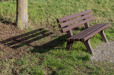 Park bench with shadow